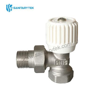 Angle radiator valve with manual handle
